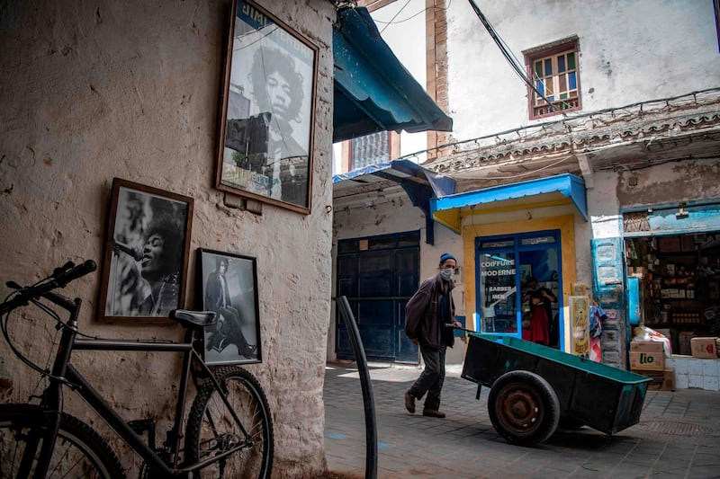 A picture taken in the Moroccan coastal city of Essaouira shows portraits of late US guitarist Jimi Hendrix.  AFP