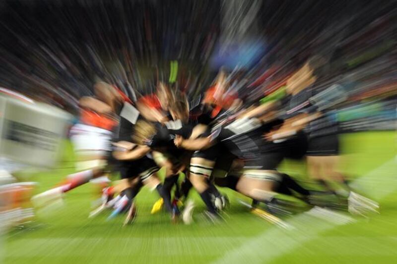 This picture using a zoom effect shows Canada's players pushing in a ruck against Tonga during the 2011 Rugby World Cup pool A match between Tonga and Canada at the Northland Events Centre in Whangarei, on September 14, 2011. Canada won 25-20.  AFP PHOTO / GABRIEL BOUYS

