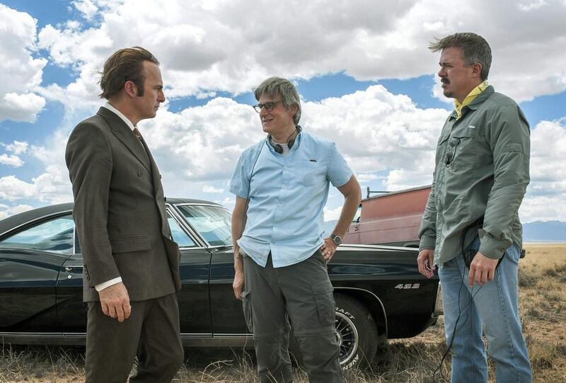 Bob Odenkirk, left, as Saul Goodman, and Better Call Saul showrunners Peter Gould, centre, and Vince Gilligan. Lewis Jacobs / AMC / AP Photo