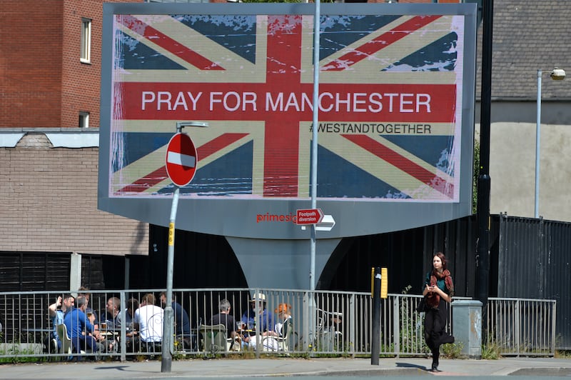 An electronic advertising board close to Manchester Arena on May 23, 2017, a day after the attack. PA