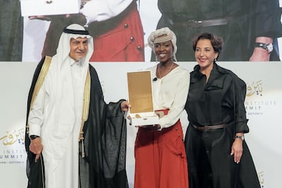 Sudanese-American poet Emi Mahmoud receives her award of recognition. Beirut Institute.   
