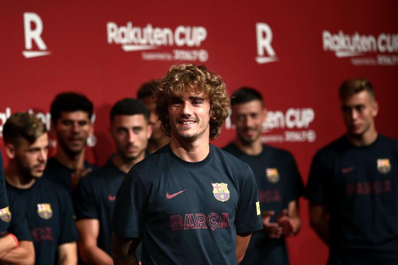Barcelona's French forward Antoine Griezmann poses onstage during the football team's reception party in Tokyo on Monday. Barcelona and Chelsea will play for the Rakuten Cup in Saitama on Tuesday. AFP