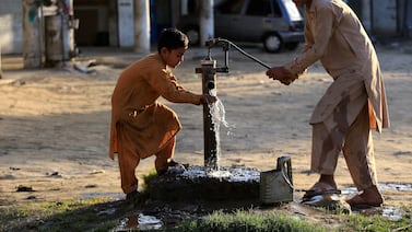 A communal well in Peshawar, Pakistan. The World Economic Forum predicts that by 2030, global freshwater demand is expected to outstrip supply by 40 per cent. EPA