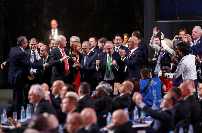 Officials celebrate after the announcement that the 2026 FIFA World Cup will be held in the United States, Mexico and Canada, during the 68th FIFA Congress in Moscow, Russia, on June 13, 2018. Sergei Karpukhin / Reuters