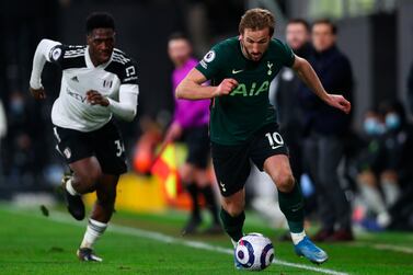 Tottenham's Harry Kane in action by Fulham's Ola Aina during the English Premier League soccer match between Fulham FC and Tottenham Hotspur in London, Britain. EPA