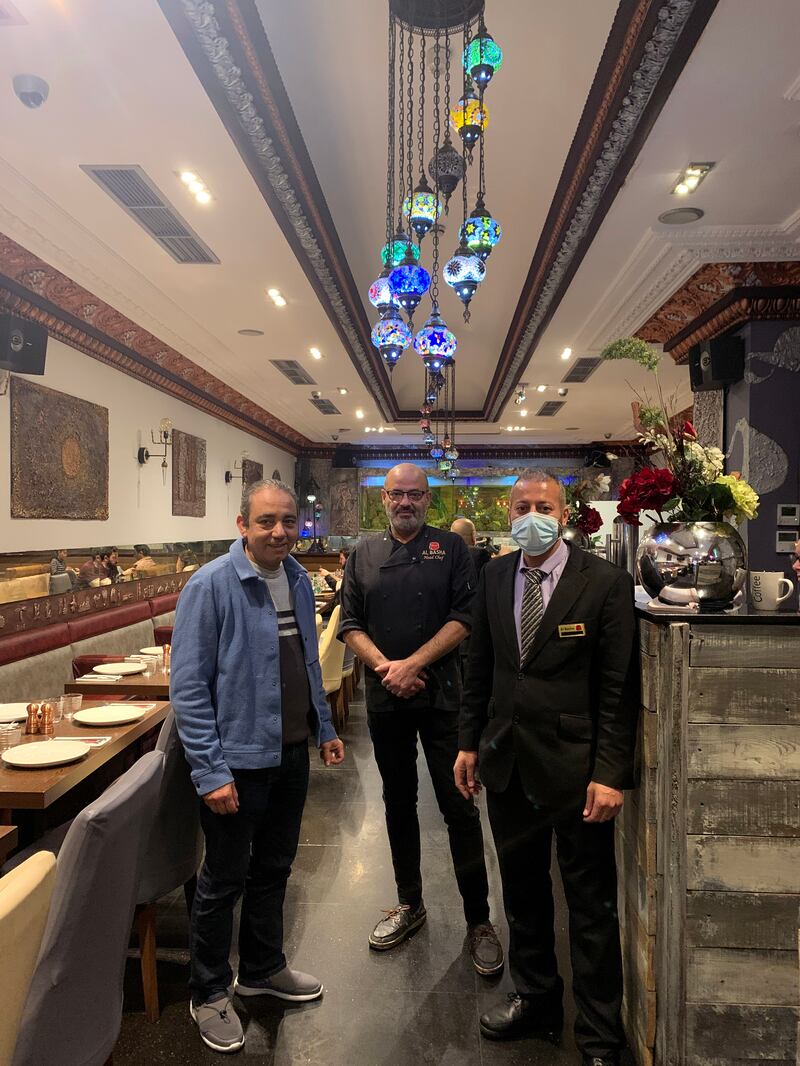 Magdy Khalil, left, owner of Al Basha restaurant in Knightsbridge, and Elias Sawaya, centre, head chef at the restaurant. Mr Khalil said the business is suffering because of cancellations caused by the Omicron variant. Photo: The National