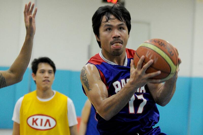 Manny Pacquiao shown during a practice with PBA team Mahindra Enforcers, then Kia Motors, before last season. Jay Directo / AFP / August 15, 2014
