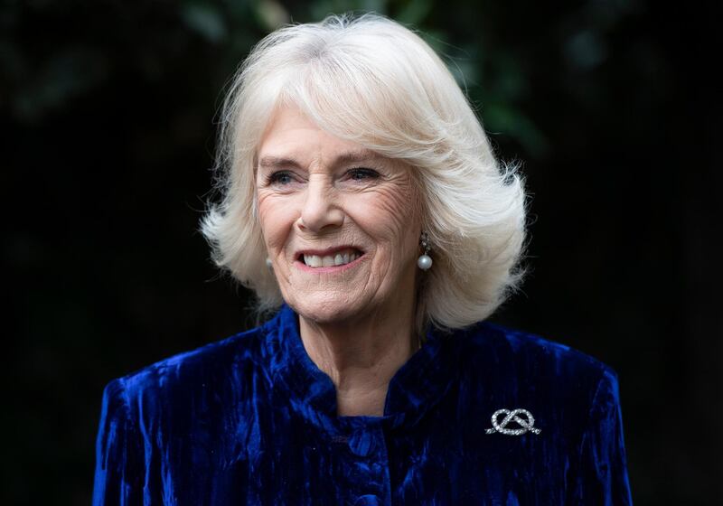 LONDON, ENGLAND - DECEMBER 16: Camilla, Duchess of Cornwall decorates the Clarence House Christmas Tree virtually with children from Helen & Douglas House Hospice, on December 16, 2020 in London, England. (Photo by Eddie Mulholland - WPA Pool/Getty Images)