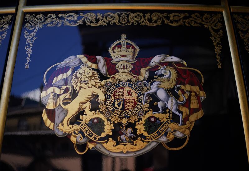A coat of arms on the Diamond Jubilee State Coach. PA