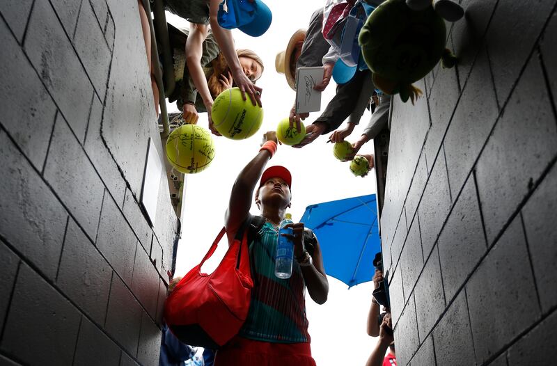 Naomi Osaka signs autographs after winning her second round match against Ukraine's Elina Svitolina at the Australian Open tennis tournament at Melbourne Park, Australia on January 21, 2016. Reuters
