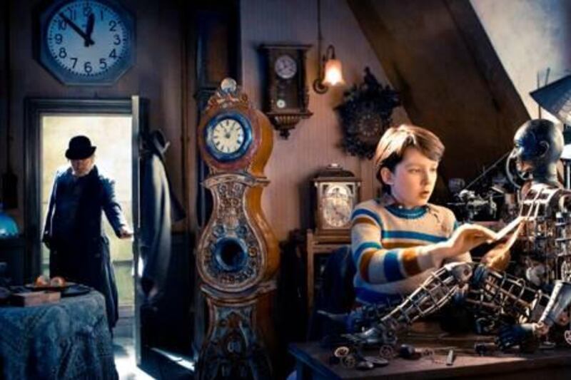 Right: Asa Butterfield star as Hugo Cabret in Paramount Pictures' Hugo.