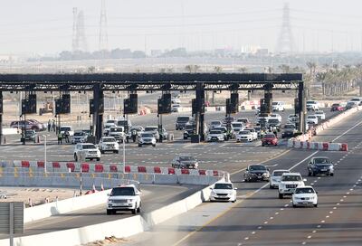 Abu Dhabi border scanners for Covid-19 are in place for commuters on the E11. Chris Whiteoak / The National