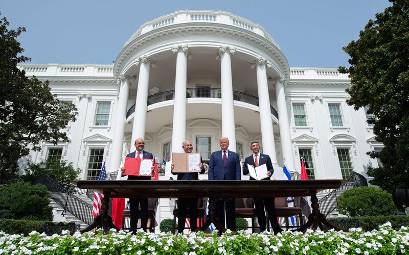 From left, Bahrain's Foreign Minister Abdullatif Al Zayani, former Israeli prime minister Benjamin Netanyahu, former US president Donald Trump and Sheikh Abdullah bin Zayed, Minister of Foreign Affairs and International Co-operation, sign the Abraham Accords at the White House in 2020. AFP