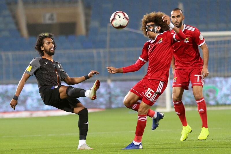 Al-Shabab player Abdulmajeed Al-Sulaihim, left, in action for the ball with Al-Wehda player Ali Al-Nemr during a match in Riyadh, Saudi Arabia. EPA