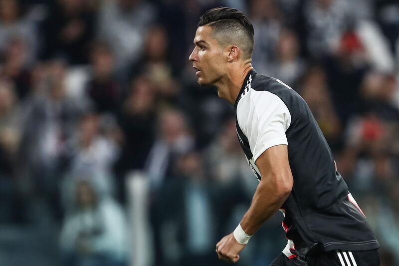 Juventus forward Cristiano Ronaldo watches the ball after shooting a penalty to give Juve a 2-1 lead. AFP