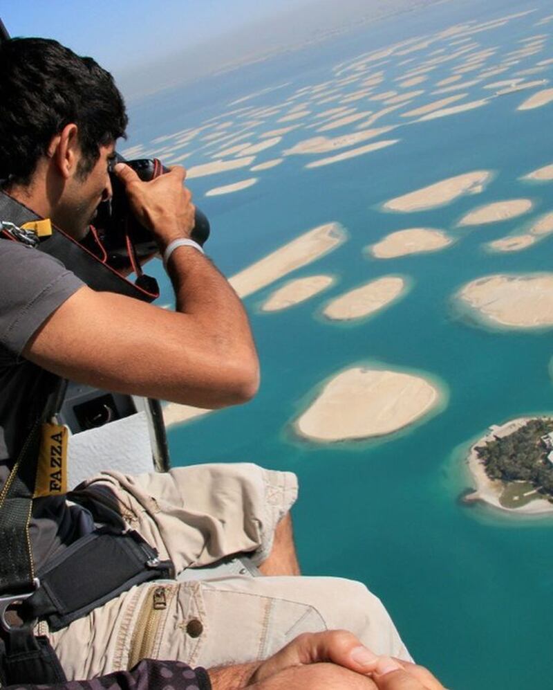 The Crown Prince of Dubai shoots The World Islands from a plane.