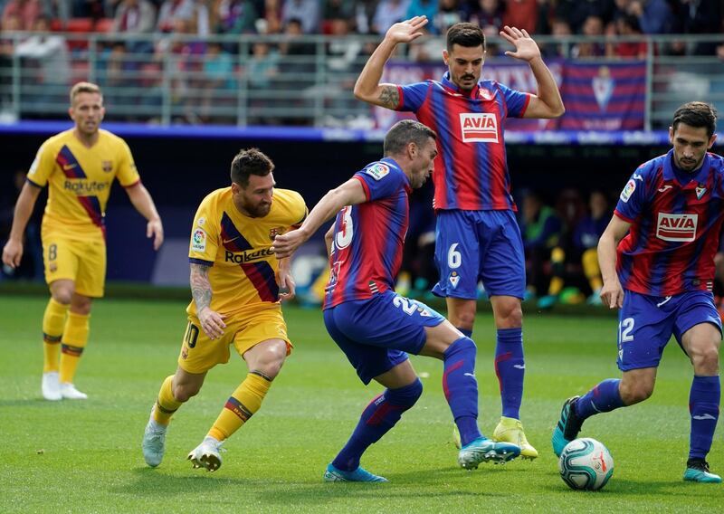 Eibar's Sergio Enrich in action with Barcelona's Arthur- Eibar v FC Barcelona - Ipurua Municipal Stadium, Eibar, Spain. REUTERS