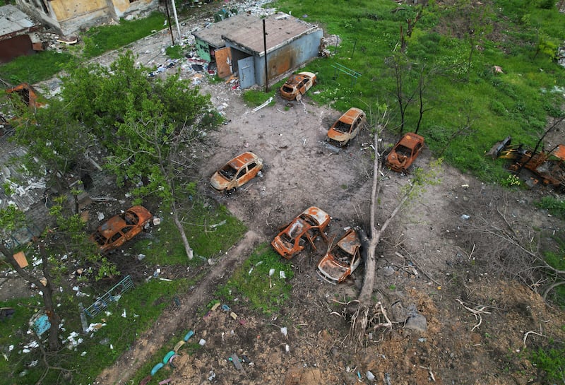 The burnt out shells of cars in a residential area near Azovstal Iron and Steel Works in Mariupol. Reuters