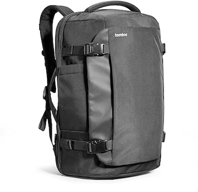 Consider investing in a waterproof cover for your backpack. Photo: Tomtoc / Amazon