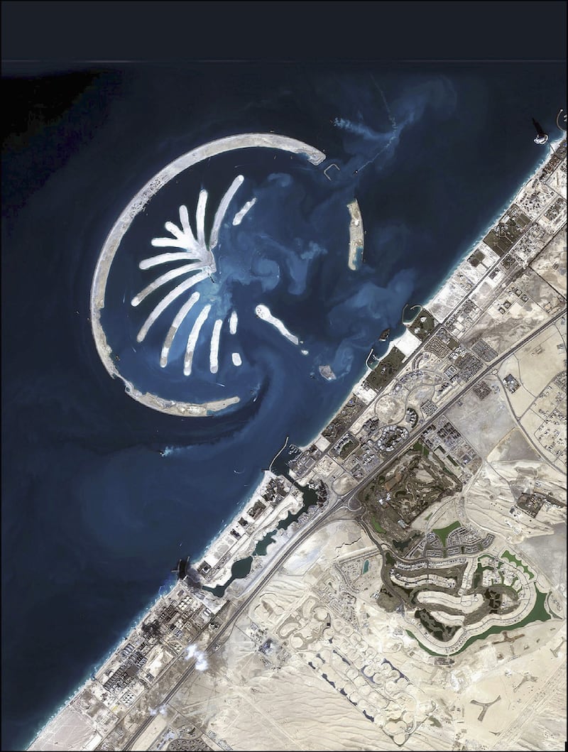 Satellite image of Palm Jumeirah shows the distinct palm tree shape emerging from the waters of the Arabian Gulf. Getty Images