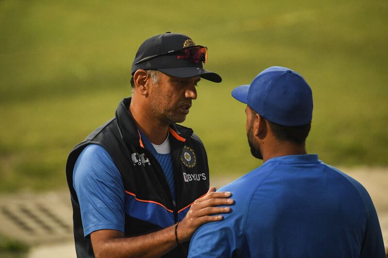 Coach Rahul Dravid talks with wicketkeeper Rishab Pant. AFP