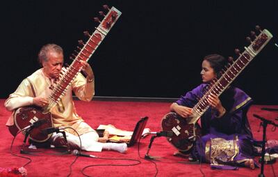 CA.Shankar,Daughter.053198?GK?left to rightIndian sitar player Ravi Shankar and his daughter Sitar player Anoushka Shankar ,during his performance at the Orange County Performing Arts Center, Costa Mesa. Reporter:Heckman  (Photo by Glenn Koenig/Los Angeles Times via Getty Images)