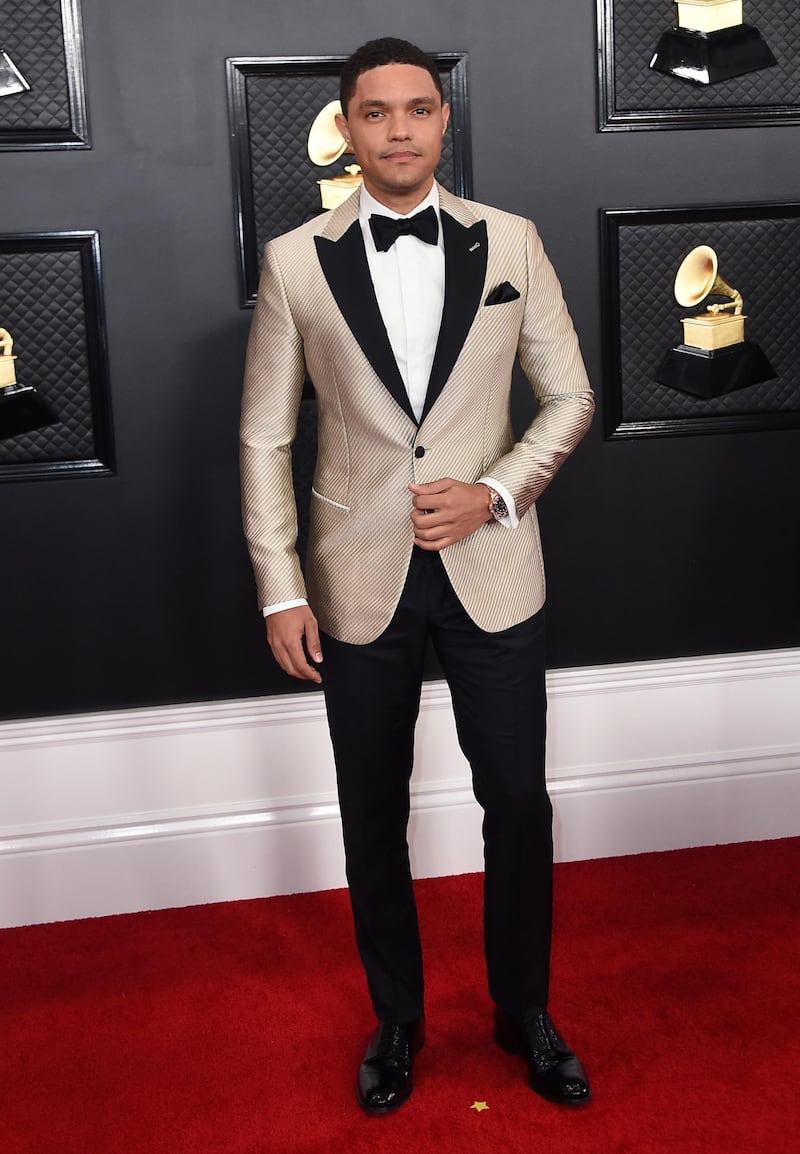 Trevor Noah looked sharp in a silver suit jacket with black lapels at the 62nd annual Grammy Awards. AP