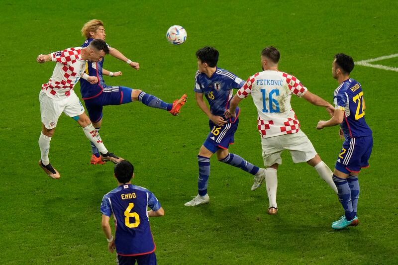 Croatia's Ivan Perisic heads home to make it 1-1. AP