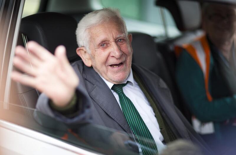 Bernard Jordan waves in Portsmouth, England, as he is driven home on his return from attending D-Day ceremonies in Normandy. Chris Ison / AP Photo / PA / June 7, 2014