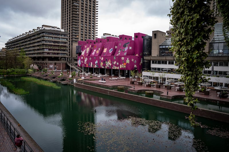 The Barbican Lakeside Terrace is covered in panels of pink and purple fabric designed by Ghanaian artist Ibrahim Mahama. PA