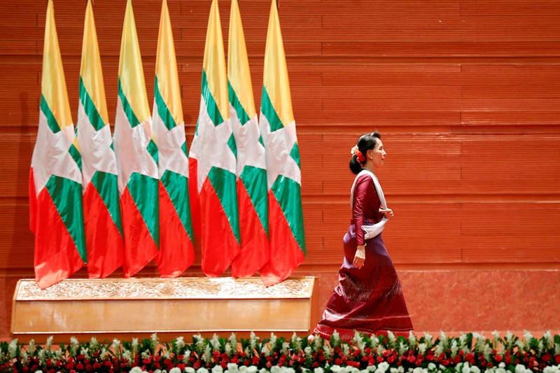 Myanmar State Counselor Aung San Suu Kyi walks off the stage after delivering a speech on the Rohingya crisis. Soe Zeya Tun / Reuters