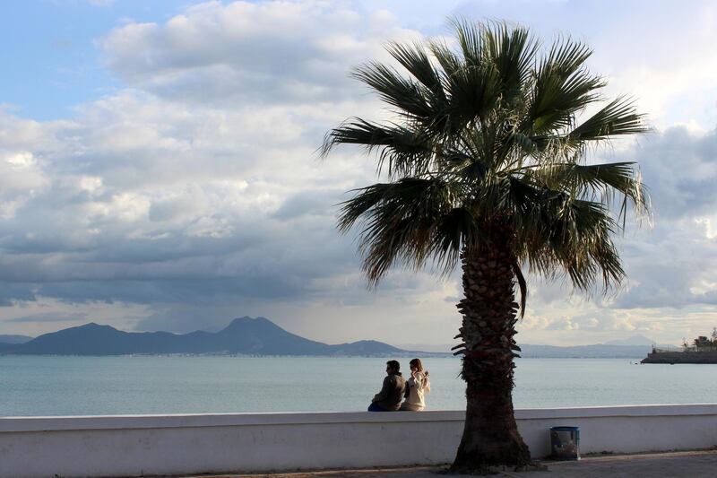 People spend an afternoon by the sea at Carthage, Tunisia. Reuters