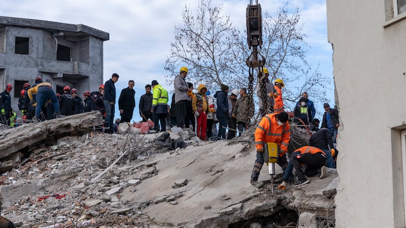 Rescuers search for survivors 36 hours after the quake, in Osmaniyeh