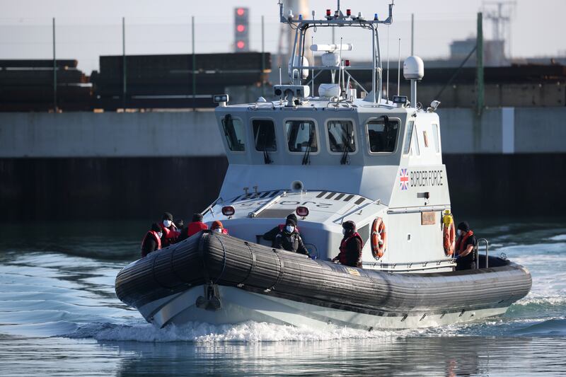 Migrants arrive into the Port of Dover after being intercepted in the Channel by the UK Border Force. Getty Images