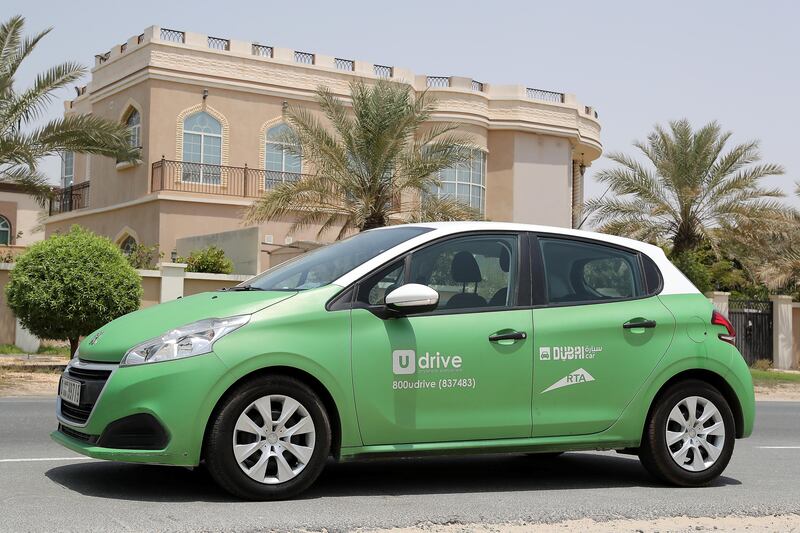 
DUBAI , UNITED ARAB EMIRATES , AUG 20  – 2017 :- Car from UDrive short term rental car services parked near the Sheikh Zayed Road in Dubai. ( Pawan Singh / The National ) Story by Adam Workman
