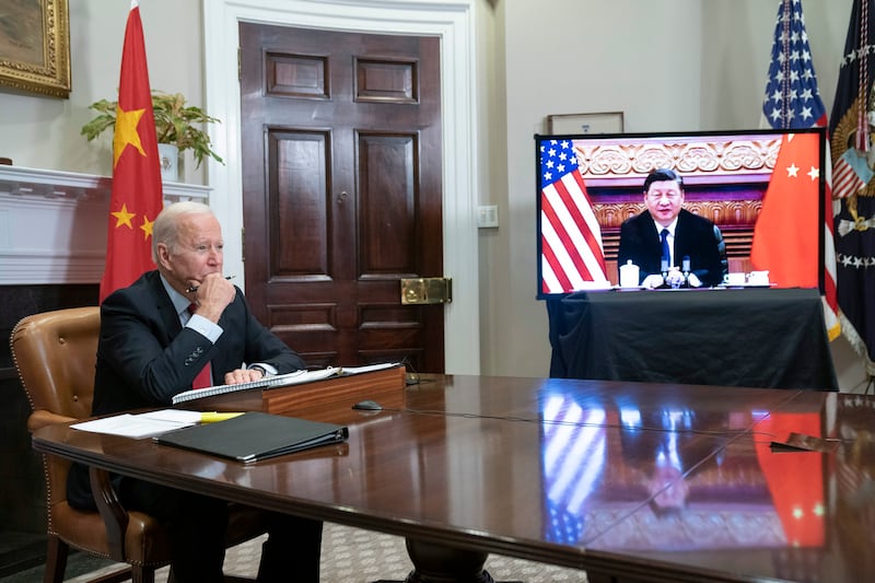 US President Joe Biden listens during virtual talks with Chinese President Xi Jinping in the Roosevelt Room of the White House. EPA
