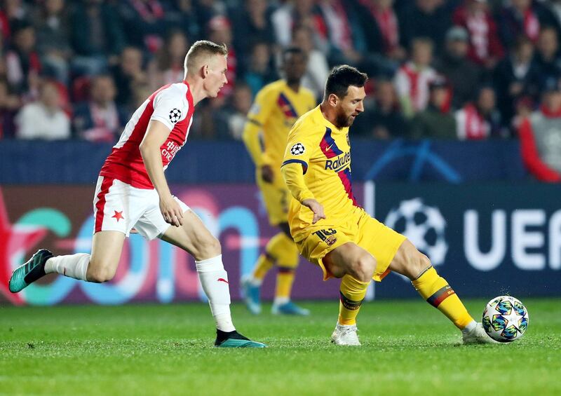 Lionel Messi, right, in action in Prague. EPA