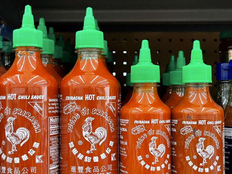 Bottles of Huy Fong Foods Sriracha sauce are displayed on a supermarket shelf in Larkspur, California. Getty Images / AFP
