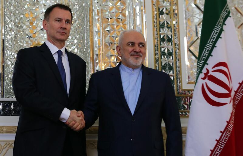 epa07176751 Iran's Foreign Minister Mohammad Javad Zarif (R) greets Britain's Foreign Secretary Jeremy Hunt in Tehran, Iran, 19 November 2018. Hunt is the first European foreign minister to visit Tehran since US President Donald Trump pulled out of the 2015 nuclear deal between Iran and several world powers in May and re-imposed sanctions on 05 November.  EPA/STRINGER