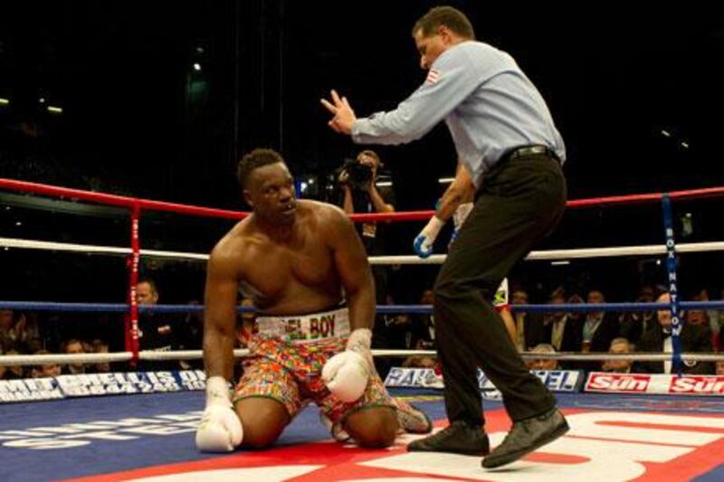 Referee Luis Pabon gives the count to Dereck Chisora during his grudge match with David Haye
