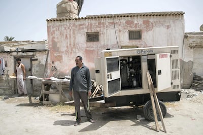 UMM AL QUWAIN, UNITED ARAB EMIRATES - SEPTEMBER 6, 2018. 

Nazaqit Sabri, 39, has a power generator installed outside his home at the old town in Umm Al Quwain. The municipality cut electricity and water three days ago from the neighborhood.

One of the country's most affordable neighbourhoods for low income families and foreign workers, who have for generations called the old town home, will soon be demolished.

(Photo by Reem Mohammed/The National)

Reporter: RUBA HAZA
Section:  NA