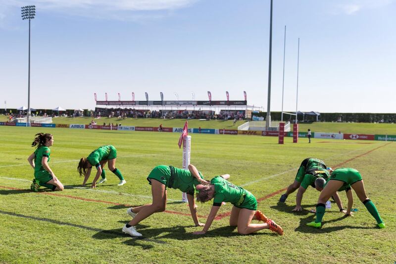 DUBAI, UNITED ARAB EMIRATES - DECEMBER 1, 2018. 

Dubai Eagles teammates warm up before their match on the final day of this year's Dubai Rugby Sevens.

(Photo by Reem Mohammed/The National)

Reporter: 
Section:  NA POAN