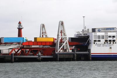 Trucks make their way onto a ferry in Hook of Holland terminal in the harbor of Rotterdam, Netherlands, Tuesday, Sept. 11, 2018.  Gert Mulder of the Dutch Fresh Produce Center that supports some 350 traders and growers associations fears the worst if negotiators trying to hammer out a Brexit deal fail. One truck driver showing up at the docks without the proper paperwork "could throw it all into chaos," he says. (AP Photo/Peter Dejong)