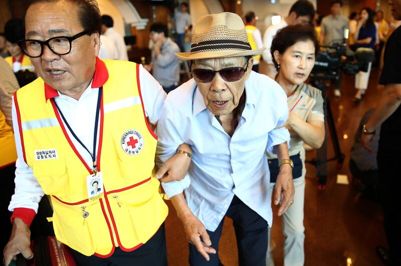 Back Min-Joon, 92, arrives at a hotel used as a gathering point, in Sokcho, near the Demilitarized Zone (DMZ)  in Sokcho, South Korea. Almost a hundred South Koreans will meet their families for the first time since separated by the Korean War decades ago. Getty