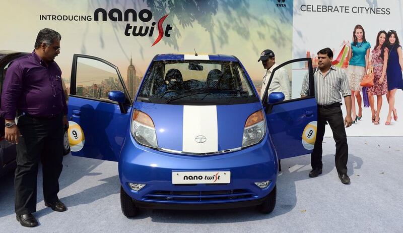Tata's Nano hit the headlines for its low price tag, but rising costs and customer demands may mean its days are numbered. Indranil Mukherjee / AFP