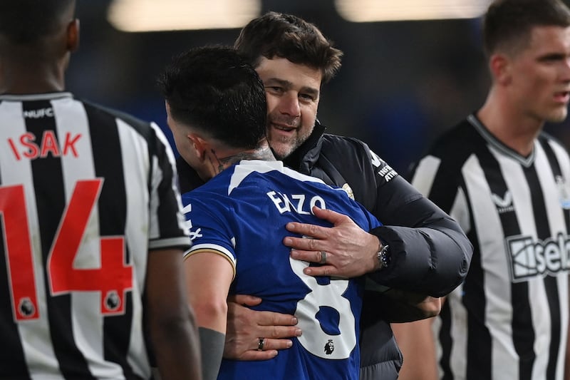 Chelsea manager Mauricio Pochettino embraces Enzo Fernandez after the win over Newcastle. AFP