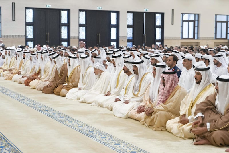 ABU DHABI, UNITED ARAB EMIRATES - June 04, 2019: HH Sheikh Diab bin Zayed Al Nahyan (R), HH Sheikh Mohamed bin Butti Al Hamed (2nd R), HH Sheikh Tahnoon bin Zayed Al Nahyan, UAE National Security Advisor (3rd R), HH Lt General Sheikh Saif bin Zayed Al Nahyan, UAE Deputy Prime Minister and Minister of Interior (4th R), HH Sheikh Saeed bin Zayed Al Nahyan, Abu Dhabi Ruler's Representative (5th R), HH Sheikh Suroor bin Mohamed Al Nahyan (6th R), HH Sheikh Mohamed bin Zayed Al Nahyan, Crown Prince of Abu Dhabi and Deputy Supreme Commander of the UAE Armed Forces (7th R), HE Shaykh Abdallah bin Bayyah (8th R) and other dignitaries, attend Eid Al Fitr prayers at the Sheikh Sultan bin Zayed the First mosque in Al Bateen. 

( Rashed Al Mansoori / Ministry of Presidential Affairs )
---