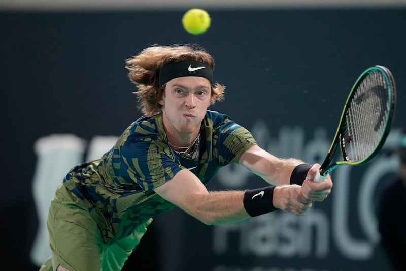 Andrey Rublev stretches to return serve against Borna Coric. AP