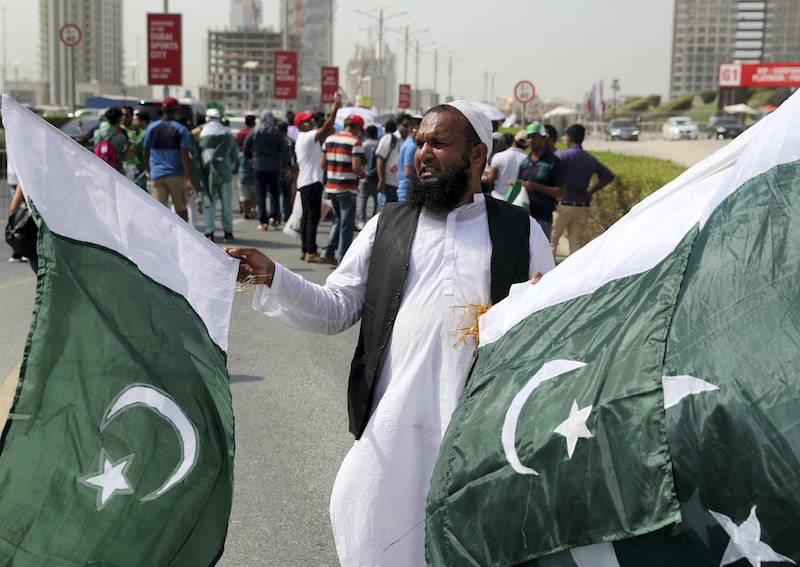 Dubai, United Arab Emirates - September 23, 2018: Pakistan fans before the game between India and Pakistan in the Asia cup. Sunday, September 23rd, 2018 at Sports City, Dubai. Chris Whiteoak / The National