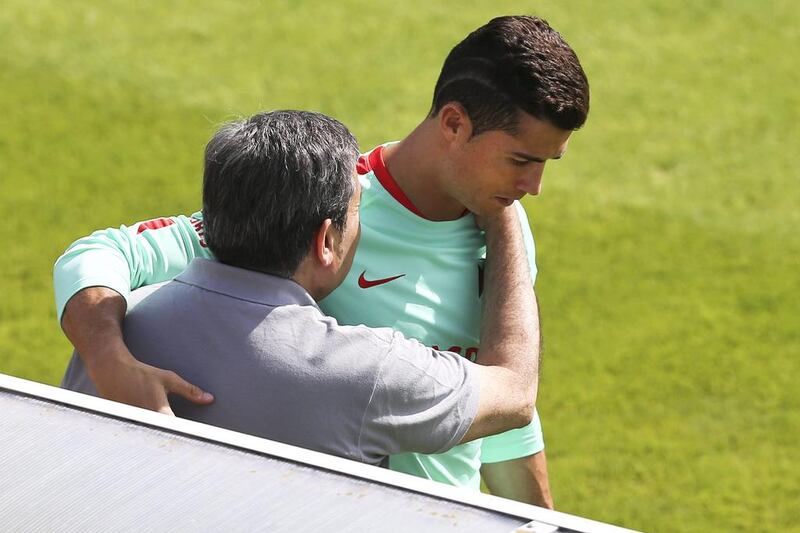 Portugal’s Cristiano Ronaldo (R) greets the President of Portugal Football Federation Fernando Gomes (L) during the training session at the French national rugby team’s camp in Marcoussis near Paris to take part on the Euro 2016, France, 08 July 2016. Portugal faces France on 10 July in the UEFA Euro 2016 Final.  EPA/MIGUEL A. LOPES